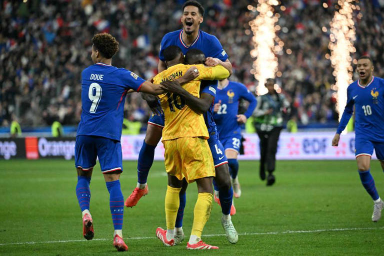 France Player celebrating with Goalkeeper Mike Magian after dramatic Penalty Shootout in UEFA Nations League 2025 Quarter-Final 2nd Leg