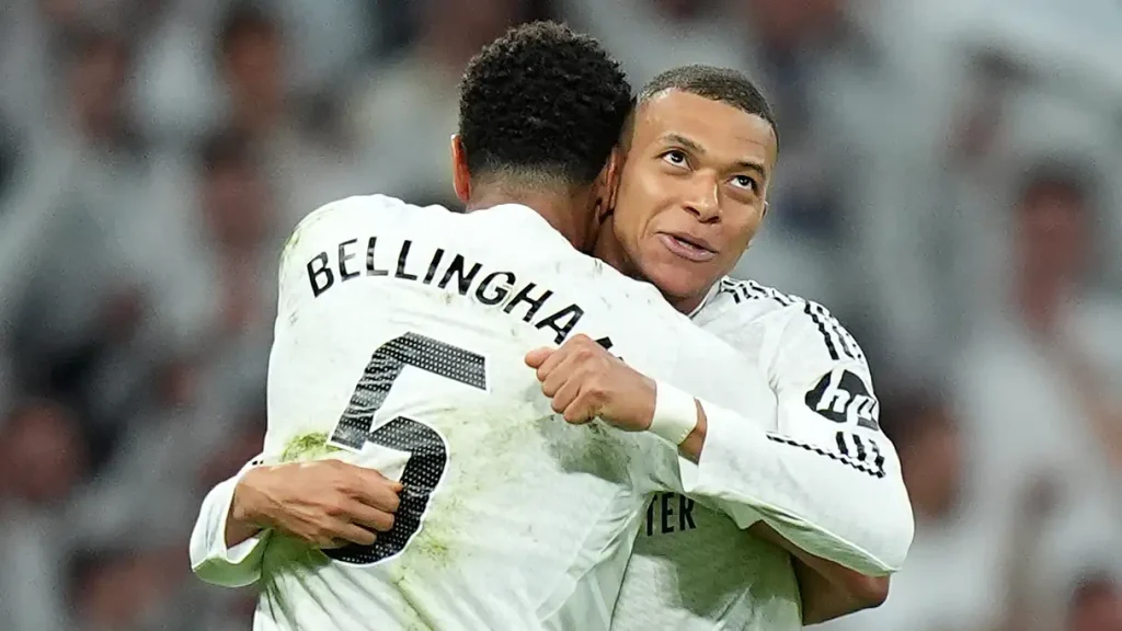 Kylian Mbappe and Jude Bellingham of Real Madrid celebrating their comeback win against CD Leganes in a thrilling match.