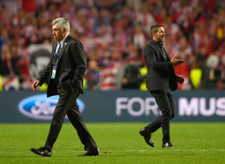 Atletico Madrid Manager Diego Simione and Real Madrid Manager Carlo Ancelloti
